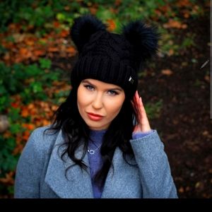 Brand New still in the Package Pom Pom Hat